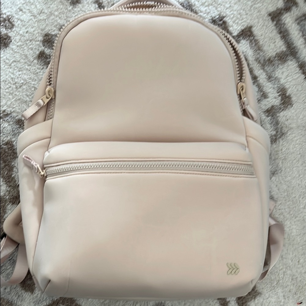 All in Motion Cream Backpack Minimalist Design